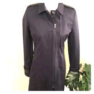 Military style trench coat, streamlined fit.